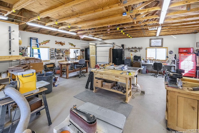 garage with a workshop area