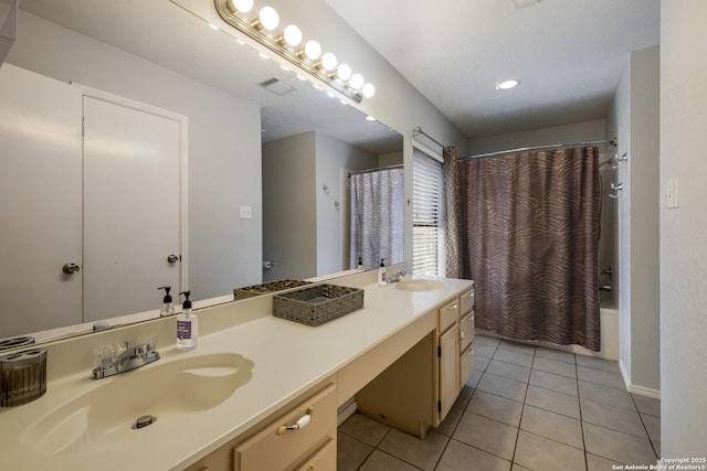 bathroom with tile patterned flooring, vanity, and shower / bath combination with curtain