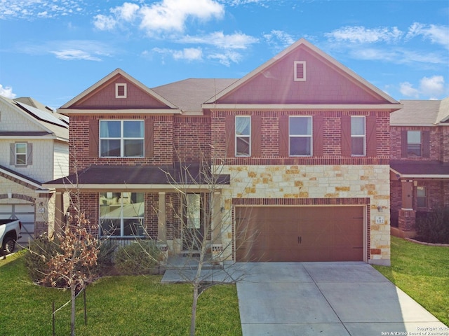 view of front of house featuring a garage and a front lawn