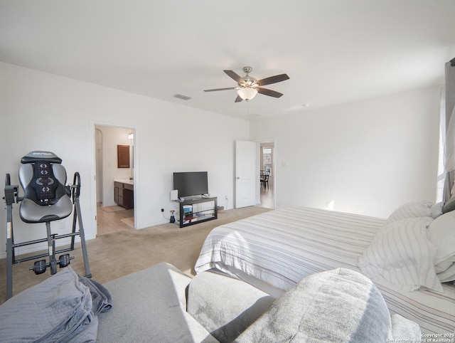 carpeted bedroom with ceiling fan