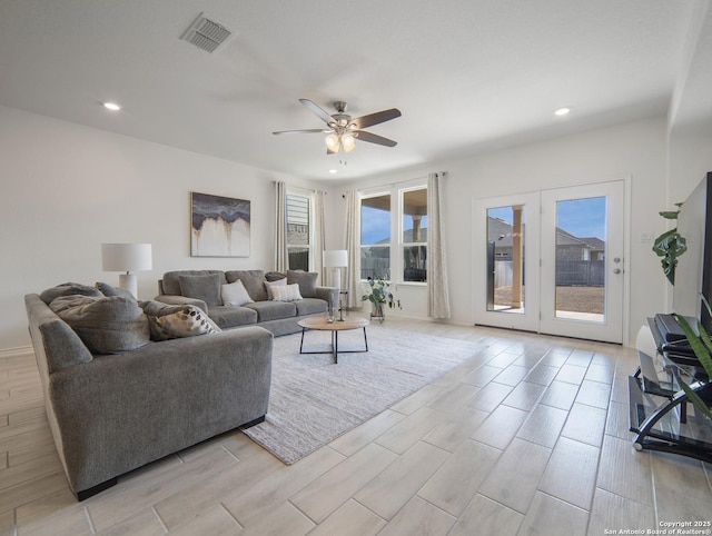 living room featuring ceiling fan