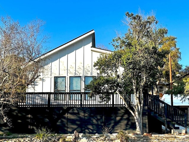 view of home's exterior with a deck