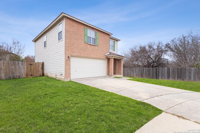 view of front facade featuring a garage and a front yard