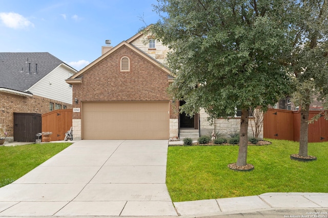 view of front facade featuring a garage and a front lawn