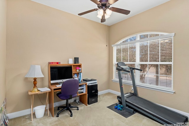 home office featuring light colored carpet and ceiling fan