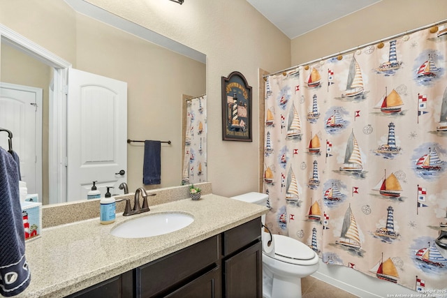 full bathroom with vanity, tile patterned flooring, shower / bath combination with curtain, and toilet