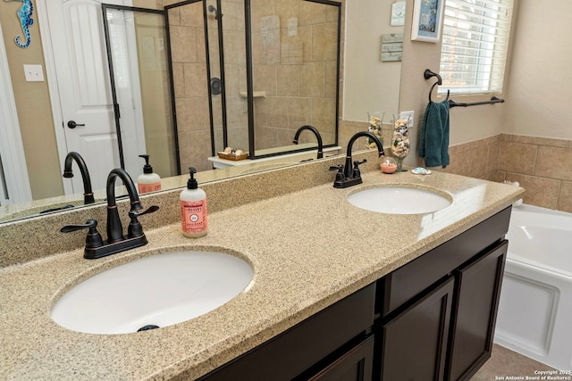 bathroom featuring vanity and a tub