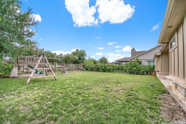 view of yard with a playground