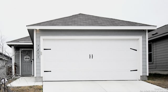 garage with driveway