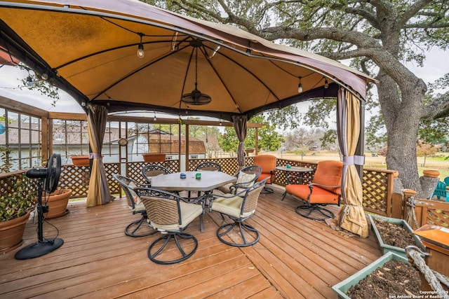 wooden deck featuring a gazebo