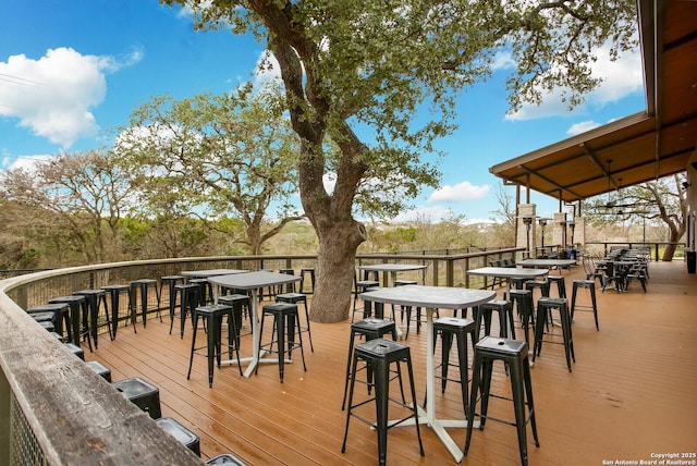 deck featuring an outdoor bar