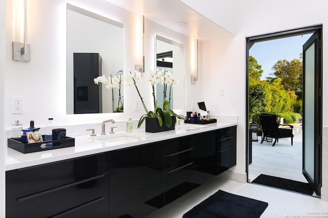 bathroom featuring tile patterned floors and vanity