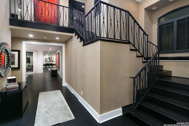 stairs with a towering ceiling