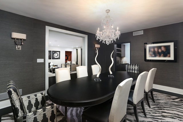 dining area with a chandelier