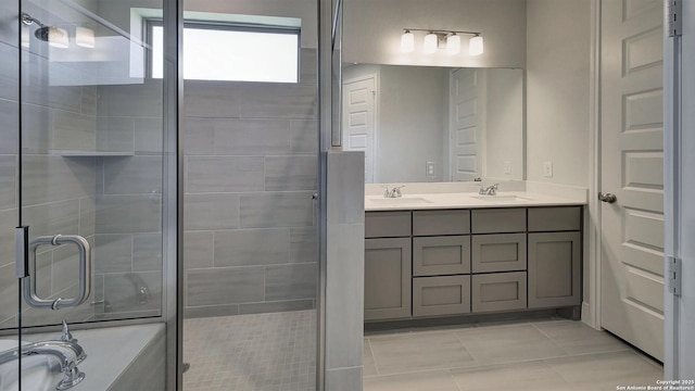 2607 Vistablue Ln, San Antonio, TX 78245 - bathroom with double vanity, a stall shower, tile patterned flooring, and a bath