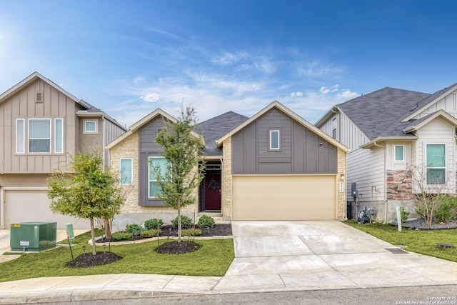 view of front facade with a garage and a front yard