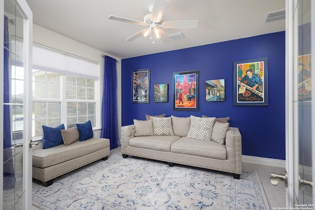 living room featuring ceiling fan