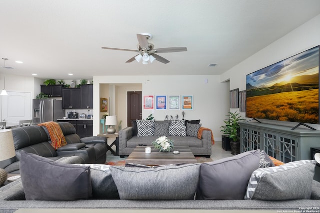 living room featuring ceiling fan