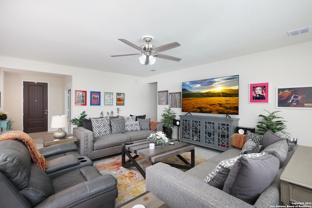 living room featuring ceiling fan