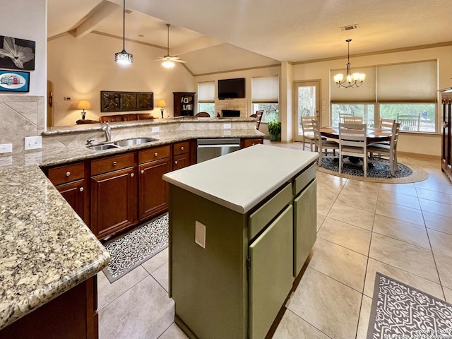 kitchen featuring sink, hanging light fixtures, vaulted ceiling with beams, a center island, and stainless steel dishwasher