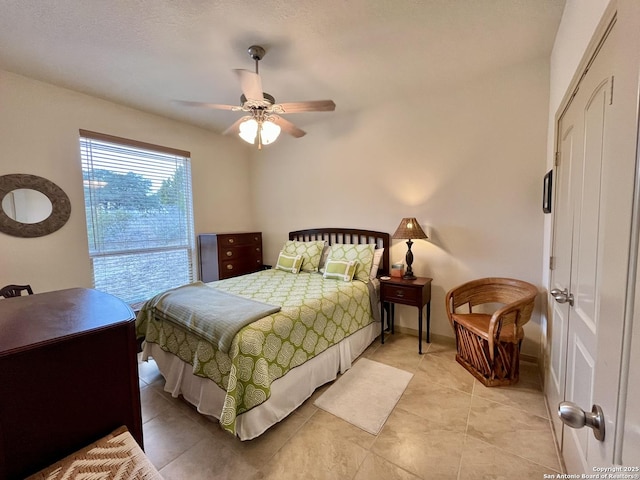 bedroom featuring ceiling fan