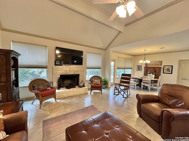 living room with vaulted ceiling with beams, crown molding, a fireplace, and plenty of natural light