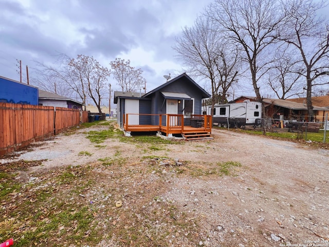 rear view of house with a deck