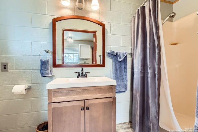 bathroom with vanity and a shower with curtain