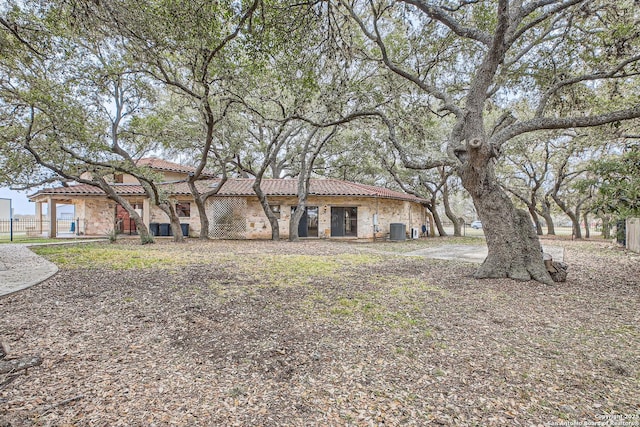 view of front of property with cooling unit