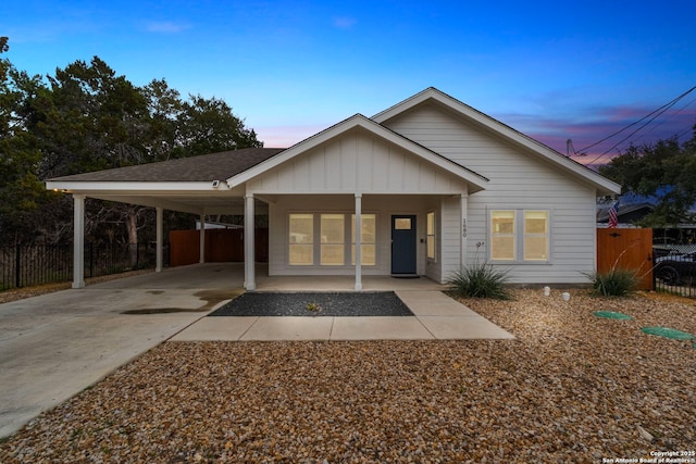 view of front of home featuring a carport