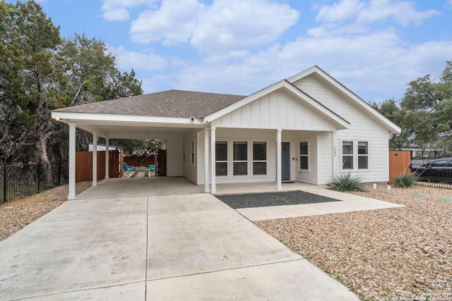 view of front of property with a carport