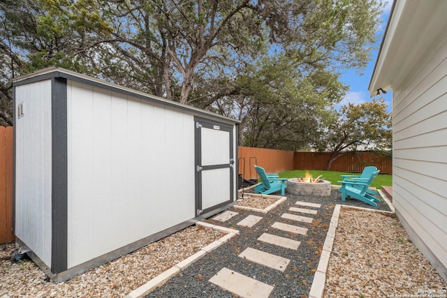 view of outdoor structure featuring a fire pit