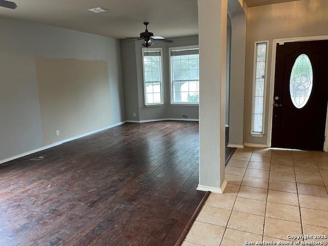 entryway featuring light hardwood / wood-style flooring and ceiling fan