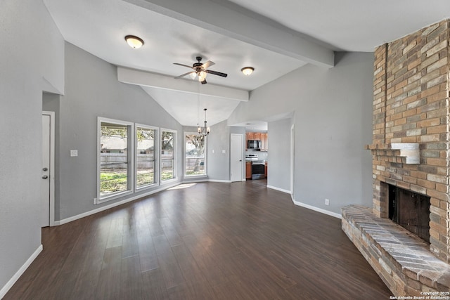 unfurnished living room with lofted ceiling with beams, dark hardwood / wood-style floors, ceiling fan with notable chandelier, and a fireplace