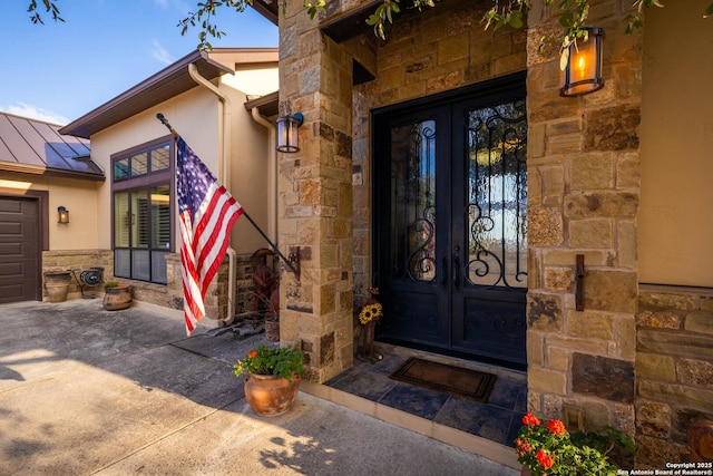 entrance to property with french doors