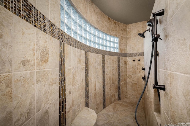 room details with a tile shower