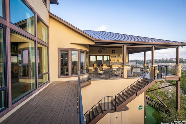 wooden terrace with ceiling fan