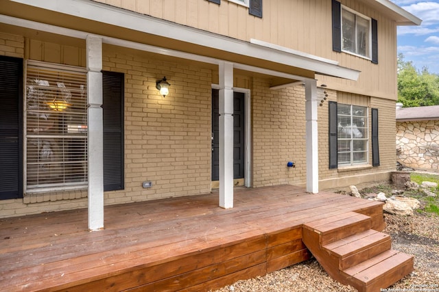 wooden terrace featuring a porch