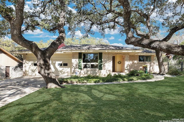 single story home featuring a garage and a front yard