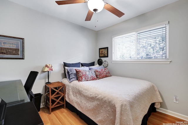 bedroom featuring ceiling fan and hardwood / wood-style floors