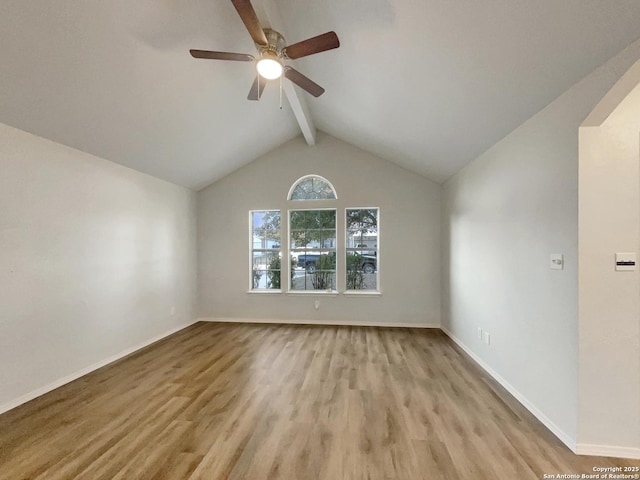 unfurnished room featuring lofted ceiling with beams, ceiling fan, and light hardwood / wood-style floors