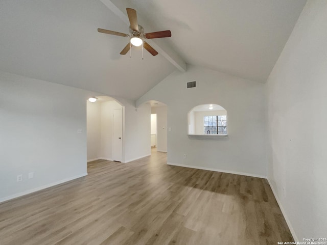 unfurnished living room featuring ceiling fan, vaulted ceiling with beams, and light wood-type flooring