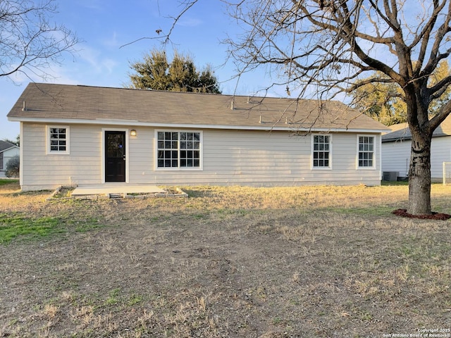 view of front of home featuring central AC unit and a patio