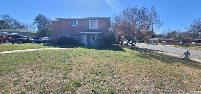 exterior space featuring a front lawn