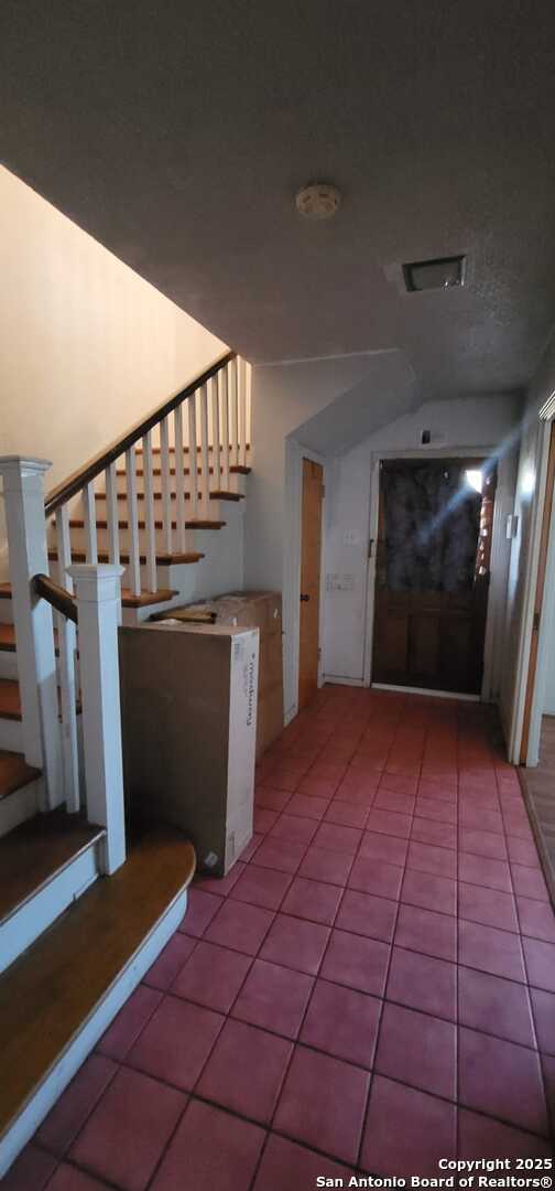 interior space featuring tile patterned flooring