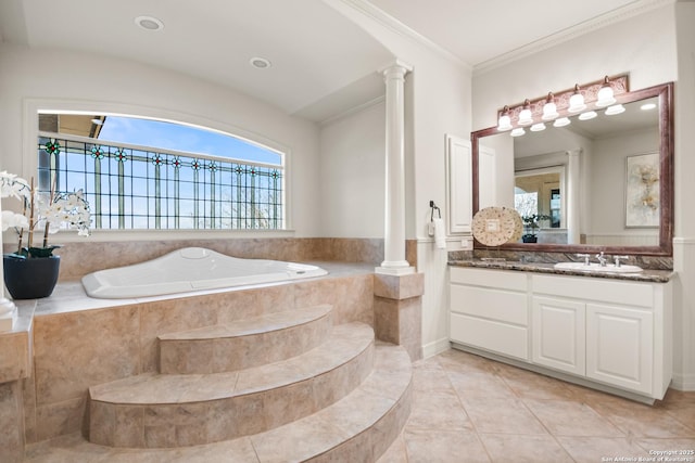 bathroom with decorative columns, ornamental molding, vanity, a relaxing tiled tub, and tile patterned flooring