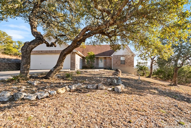 ranch-style home with a garage