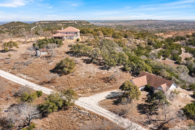 drone / aerial view featuring a mountain view