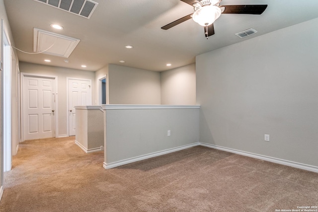 carpeted empty room with ceiling fan