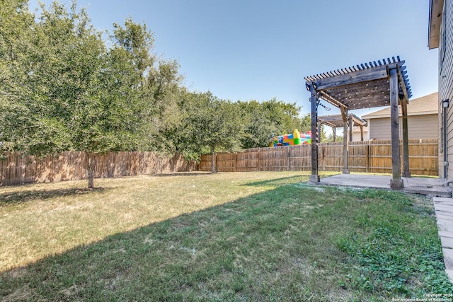 view of yard featuring a patio and a pergola